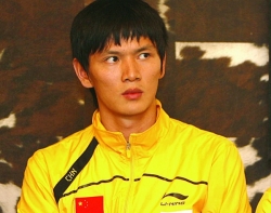 Bao Chunlai in badminton outfit.