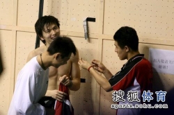 Bao Chunlai at badminton training.
