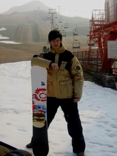Bao Chunlai snowboarding.