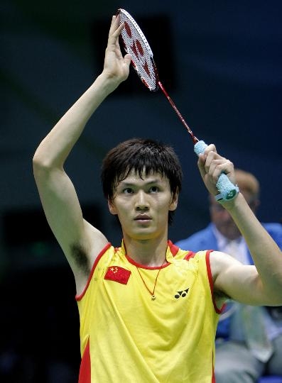 Bao Chunlai with Yonex badminton racket.