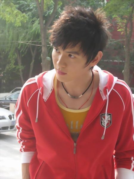 Handsome Bao Chunlai in red jacket.