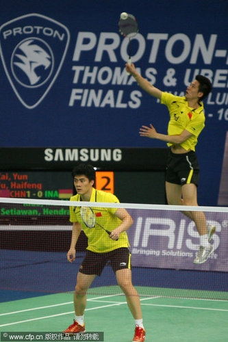 Cai Yun in a doubles badminton match.