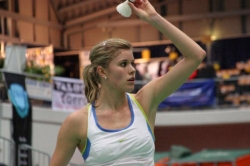Carola Bott badminton serve.
